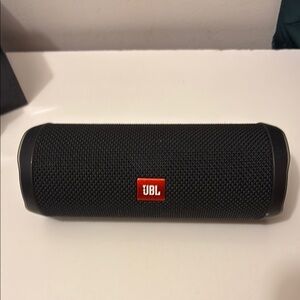 JBL Black Portable Speaker with Bluetooth and Sleek Design